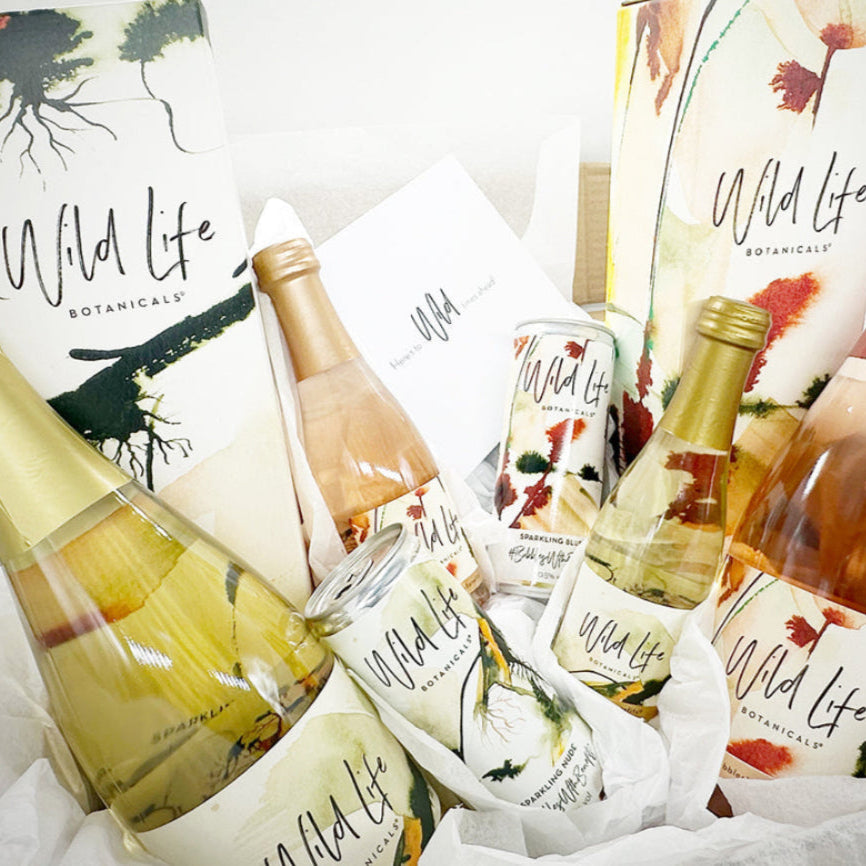 2 bottles of 75cl Wild Life Botanicals (1 Sparkling Nude and 1 Sparkling Blush) with 2 bottles of 20cl Wild Life Botanicals (1 Sparkling Nude and 1 Sparkling Blush) and 2 x 250ml cans Wild Life Botanicals (1 Sparkling Nude and 1 Sparkling Blush). 2 x 75cl bottle gift boxes and gift card.